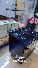  2 غازي يونيفرسال ايطالي لون اسود 80سم مجدد بالكامل كهرباء الفرن شغاله نار زرقاء للطهي يوجد كفاله تهري