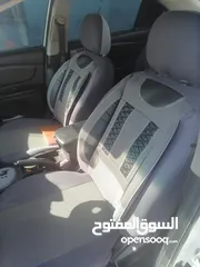  16 كيا اوبتما لوتسي 2009 لون ابيض بحالة جيدة جدا