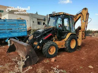  1 جي سي بي كتربلر باكو لودر حفار حفاره
