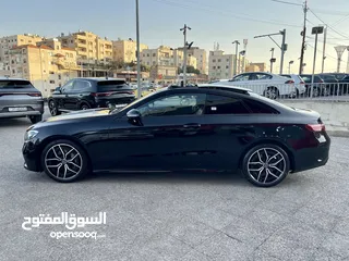  7 مرسيدس E200 AMG كوبيه اسود 2023 كت و بانوراما وارد المانيا بحالة الزيرو