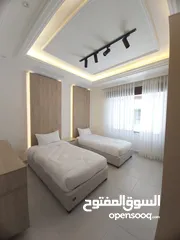  1 شقة ارضية مفروشة للايجار ثلاث غرف نوم جديدة في الدوار السابع