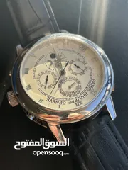  1 ساعه لون فظي الكستك متغيرPATEK PHILIPPE GENEVE