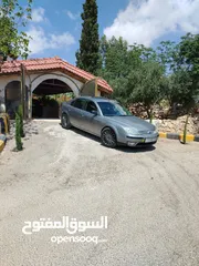  1 سياره فورد مونديو مديل 2006 للبيع