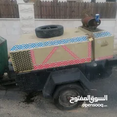  4 معدات انشائية ماتور كهرباء مقص كمبريسة  ومعدات أخرى