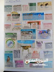  29 طوابع من جميع دول العالم بنص دينار فقط