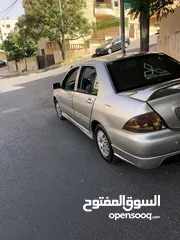  3 لانسر 2004 مميزه