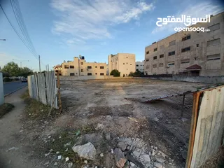  1 استثمر بالجندويل مقابل مجمع الحسين للاعمال قطعة ارض سكن ج للبيع