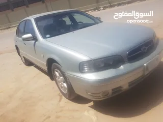  1 سامسونج SM 520 موديل 2004 محرك 20  وارد كوريا مكيفة  العنوان بنغازي القشرة الخلفية اليمين