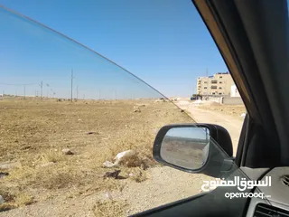  8 قطعة أرض 600 م للبيع قرب طريق المطار وجامعة الإسراء - أبو دبوس - منطقة بناء حديث وفلل
