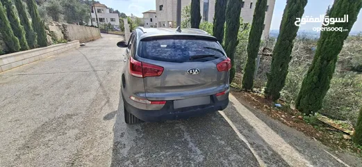  9 جيب كاياسبورتاج موديل 2014-اتومتيك'دفع 4×4 ماتور 2000ديزل فل فل اضافات ماعد الفتحة - نظيف من الاخر