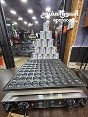  1 ماكينة ميني بان كيك 100 حبة مستعملة للبيع