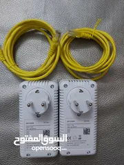  2 Power Line Connector ( PLC ) Adapter. Wireless Communication Kit. مجموعة اتصال للنت لاسلكية.