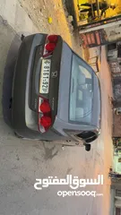  2 هندا سفيك 2008عداد 63000اف اصلي سيار ة  ب