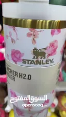  3 Stanely cup new style مطرة ستانلي برسمة جديدة مختمة ختم الاصلي  لون ابيض مورّد بزهر تحفظ البرودة