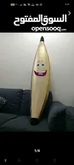  4 موزة ذهبية من القرية العالمية ومجموعة ألعاب - A golden banana from Global Village and a set of toys