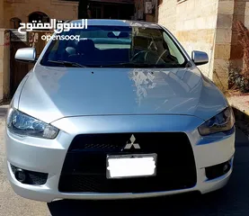  11 ميتسوبيشي لانسر 2014 بحال الوكالة