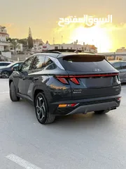  16 هونداي توسان ترخيص 2022 محرك 1600 هايبرد plug in/يقطع على الشحنه 65 كيلو متر  271 حصان