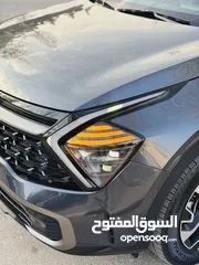 15 كيا سبورتاج هايبرد 2023 فل كامل مع بانوراما - باللون المميز والداخلية المميزة - والسعر المميز