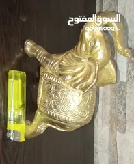  9 فيل نحاس منقوش