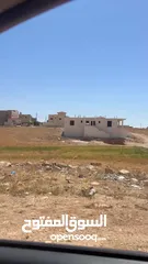  12 ارض سكنية استثمارية في رجم الشامي على بعد 1 كم نت شارع المية بسعر مميزز جدا