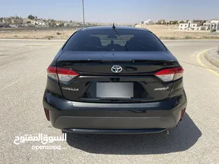  4 تويوتا كورولا 2020 هايبرد لون اسود حره باسم المستورد