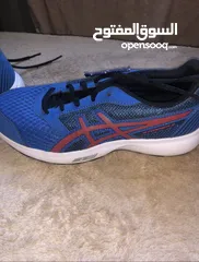  2 New Asics Shoes