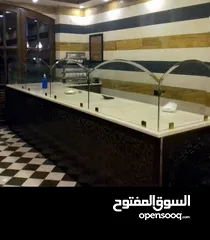  8 تفصيل تنفيذ وصيانة ابواب واجهات السيكوريت بافضل جوده ووقت وسعر