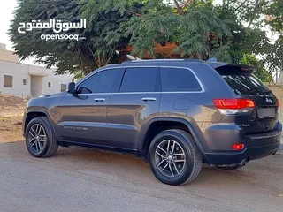  27 جيب جراند شيروكي فل الفل اعلى فئة بانوراما 2014 فحص كامل لون فيراني مميز بسعر مغري قابل للبدل والاقص