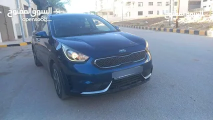  27 كيا نيرو لون كحلي فحص 2 جيد بسعر مغري قابل للبدل