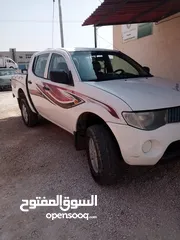  4 بك اب متسوبيشي   l200 موديل 2009 فور ويل 4X4