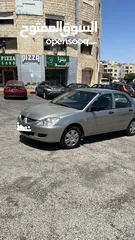  1 ميتسوبيشي لانسر موديل 2005 قير عادي للبيع