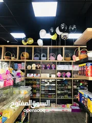  13 محل تجاري ع الشارع الرئيسي منطقه حيويه