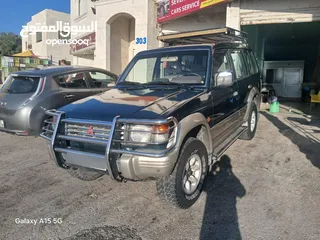 12 ميتسوبيشي باجيرو موديل 1997 نخب فحص كامل دفع رباعي السعر قابل للتفاوض