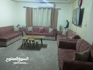  1 كنب مع طاولات وبرداي وسجادة