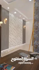  27 حوّل جدرانك مع خدمات البانل والتصميم الاحترافية Transform Your Walls with Professional paneling.