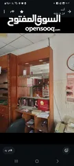  9 ديكور خشب بلوط يصلح لمحل عطور بصريات خلويات