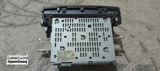  4 The displays an original equipment manufacturer (OEM) car stereo unit for a Toyota Corolla, 2013