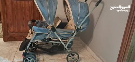  7 عربة أطفال توأم مستعمل بحالة جيدة  ماركة MAMA LOVE