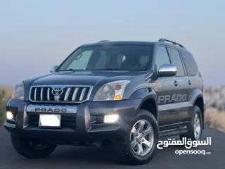  1 تويوتا برادو جيب موديل 2005  ليمتد من فحص كامل بحالة الشركة فل عدا الفتحة ممشى قليل لون فيراني بحالة