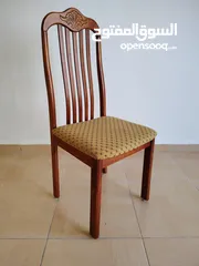  1 طاولة سفرة ماليزي 8 كراسي (كرسي واحد بحاجة الى صيانة)