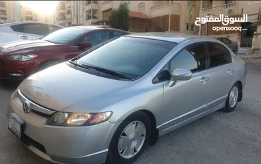  10 هوندا سيفيك هايبرد 2007 دهان وكالة جديد بتمشي 350 كيلو بالتنكة.