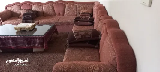 4 sofas and a table