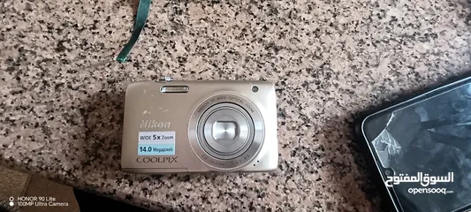  1 كاميرا نيكون للبيع 14 mpx coolpix 3100 s 45 دينار قابل للتفاوض
