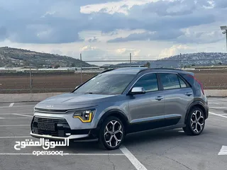  17 كايا نيرو  هايبرد (بنزين+كهرباء ) فل الفل  فتحة سقف  لون مميز اضافات مميزة /2022 جناح اسود