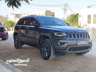  10 جيب جراند شيروكي فل الفل اعلى فئة بانوراما 2014 فحص كامل لون فيراني مميز بسعر مغري قابل للبدل والاقص