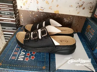  2 محل ملابس قطنيات اصلية واحذية طبية جلد اصلي