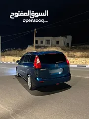  7 مازدا 5 جير عادي 6+1 متور 2000 بنزين رخصه و تامين جديد  عداد قليل فحص نخبب سعرر كااششش