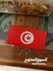  1 علمات تونس
