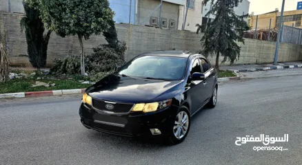  2 كيا فورتي فل مع فتحه سقف وبصمه 2011 اصل برايفت