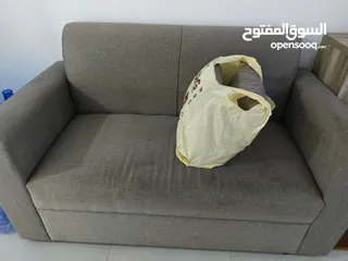  1 2 seater sofa with cushions10 KD